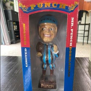 Mr. Punch Bobblehead, Limited Edition. This can be the best White Elephant gift
